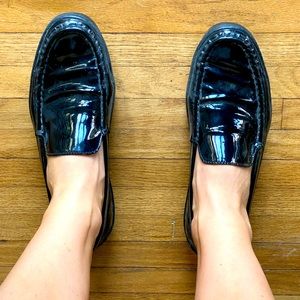 Tod’s black leather loafers